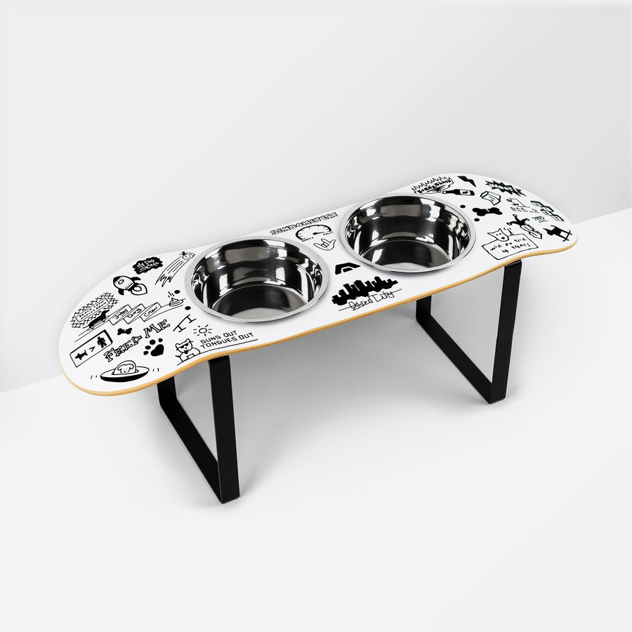 Skateboard dog bowl feeder stand handcrafted with custom designed art.