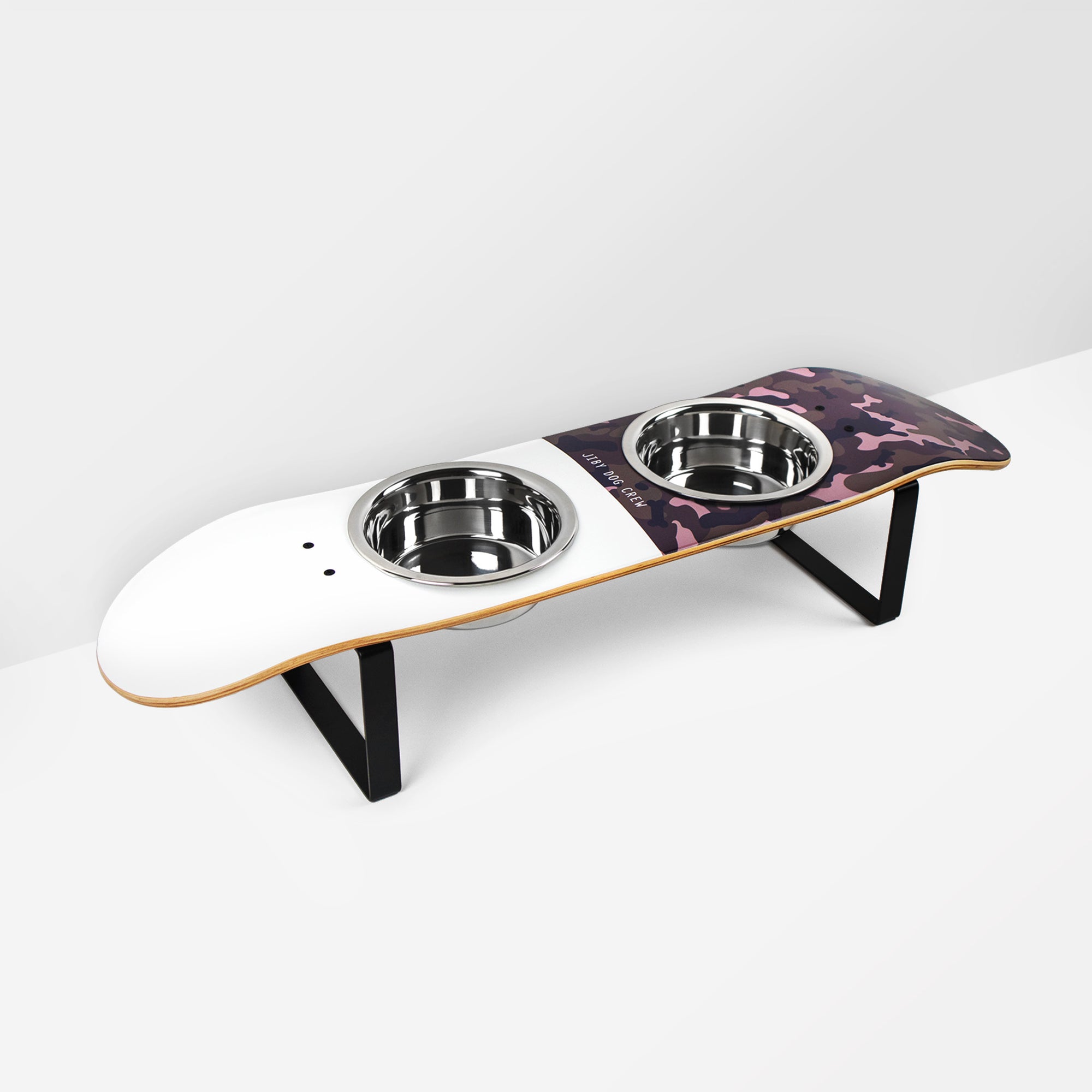 Skateboard dog bowl feeder stand handcrafted with custom designed art.