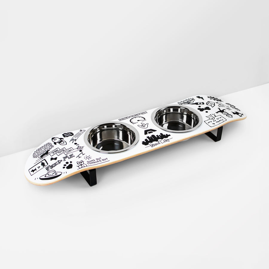 Skateboard dog bowl feeder stand handcrafted with custom designed art.