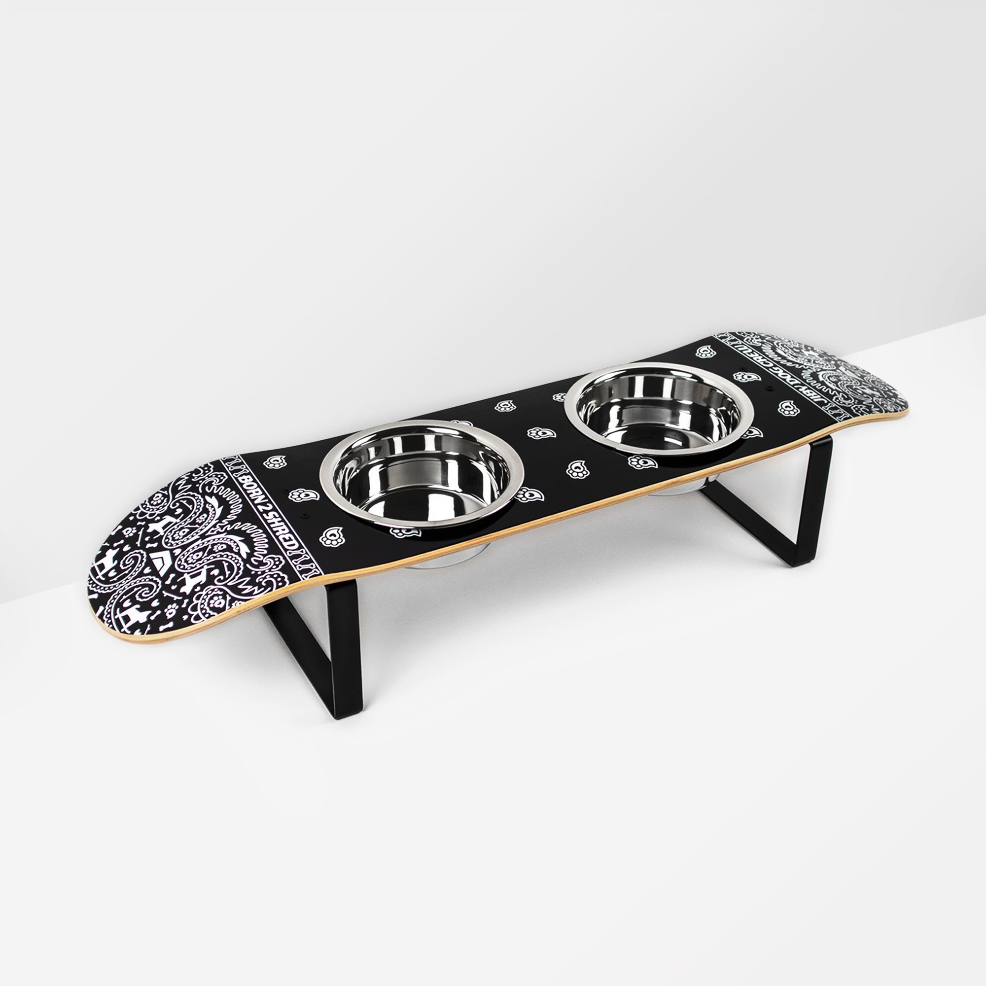 Skateboard dog bowl feeder stand handcrafted with custom designed art.