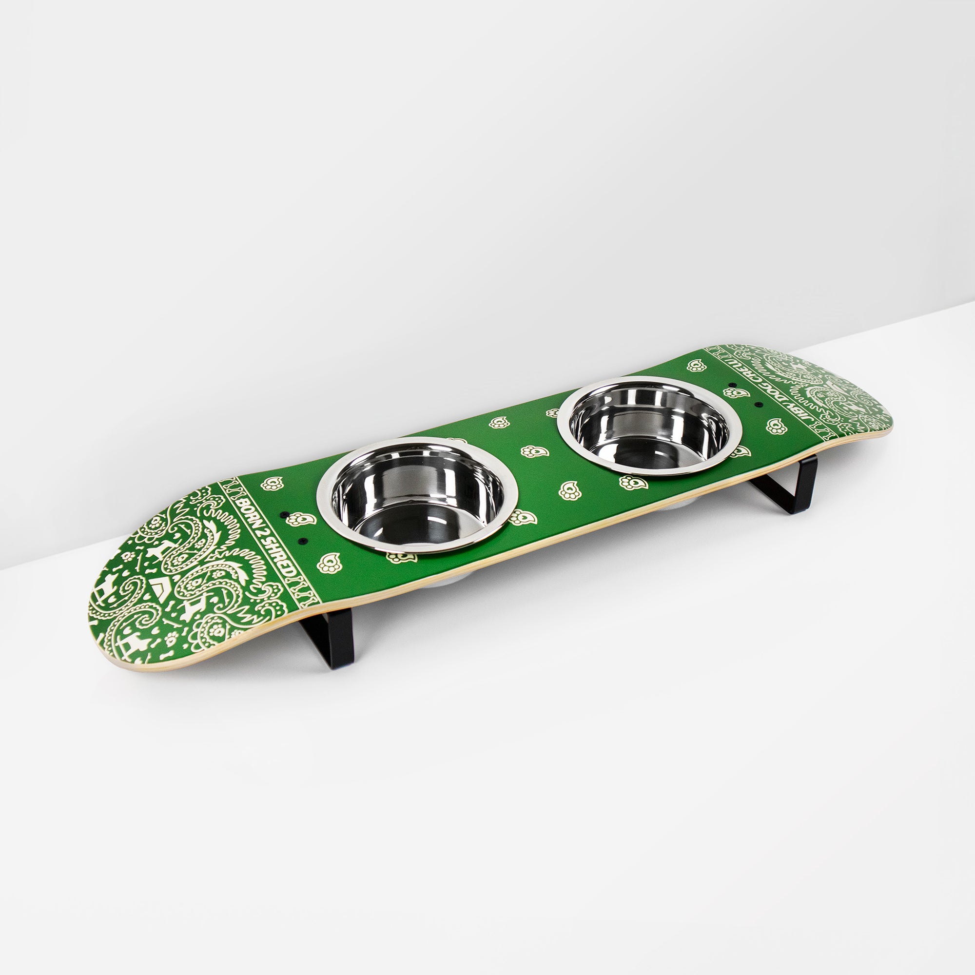 Skateboard dog bowl feeder stand handcrafted with custom designed art.