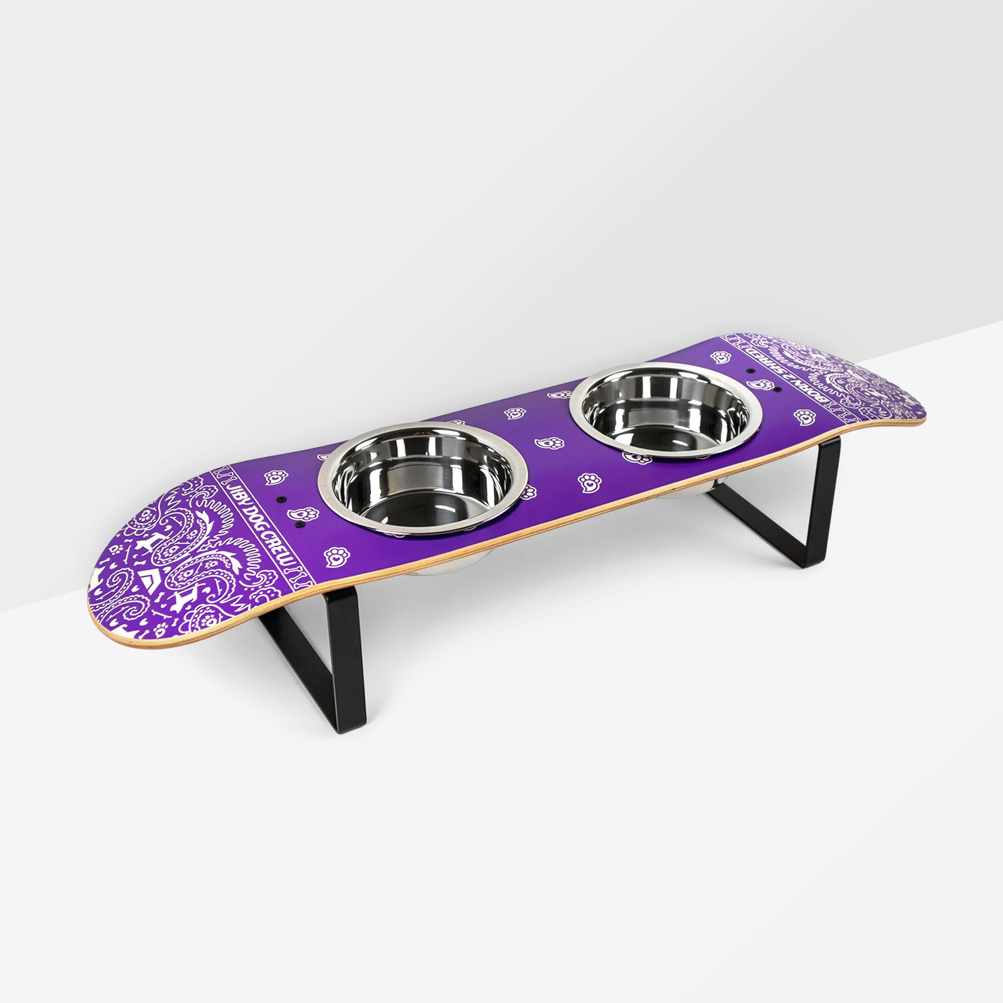 Skateboard dog bowl feeder stand handcrafted with custom designed art.