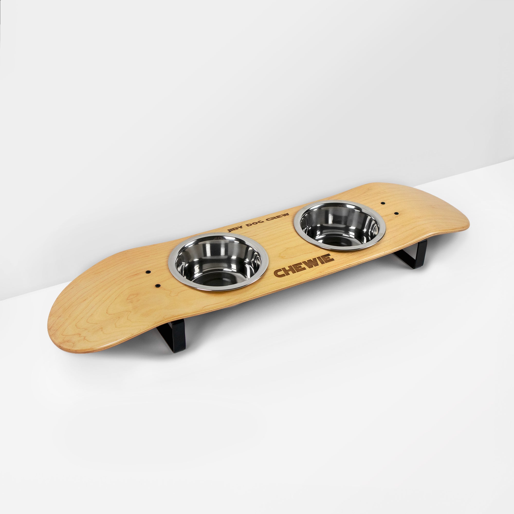 Skateboard dog bowl feeder stand handcrafted with custom designed art.