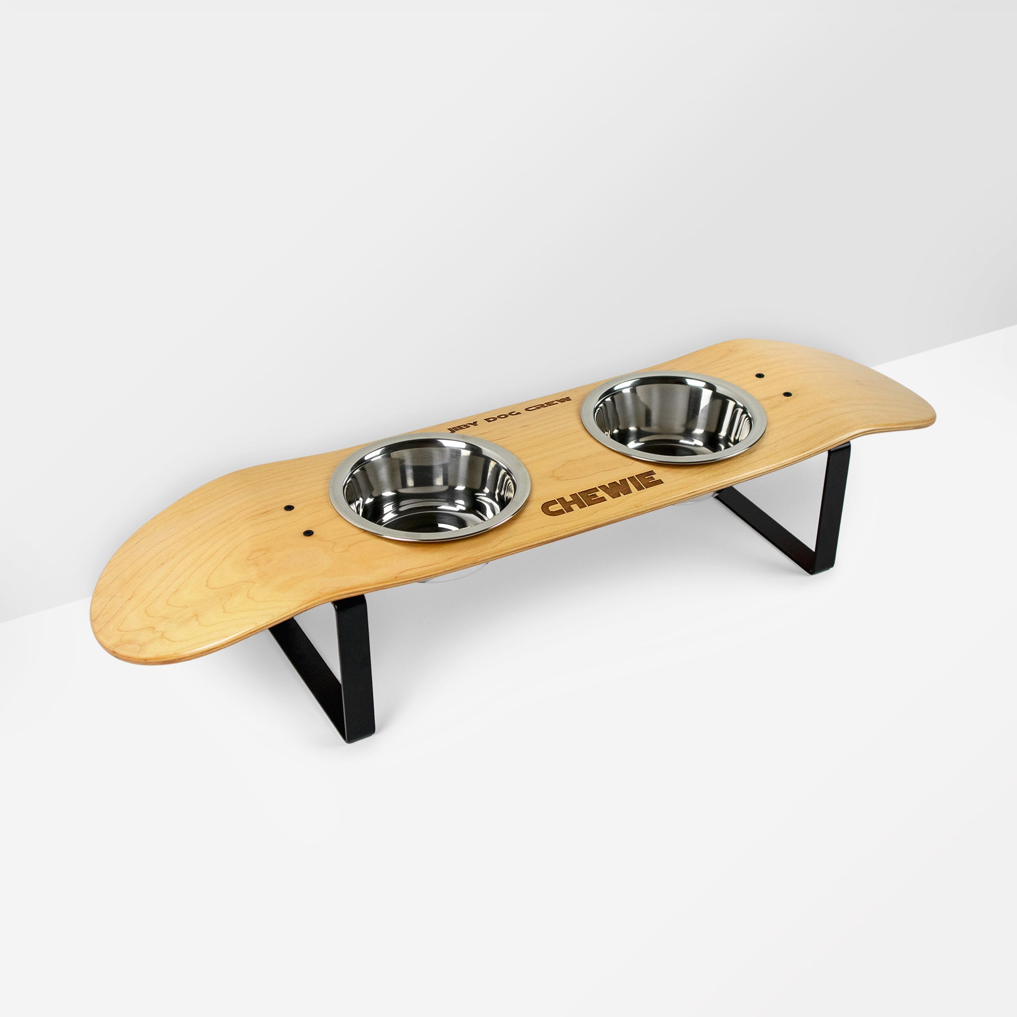 Skateboard dog bowl feeder stand handcrafted with custom designed art.